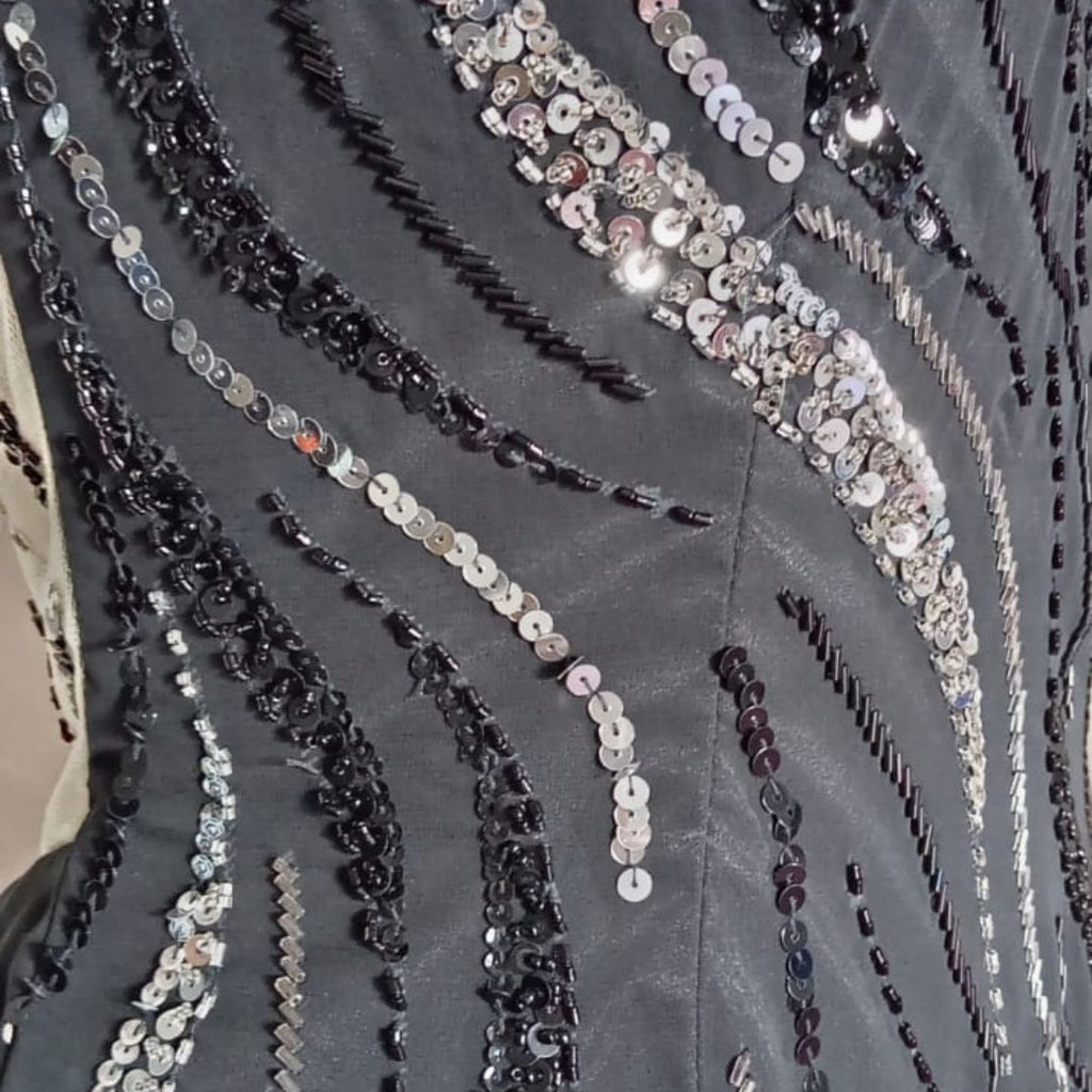 Vestido de fiesta negro con lentejuelas
